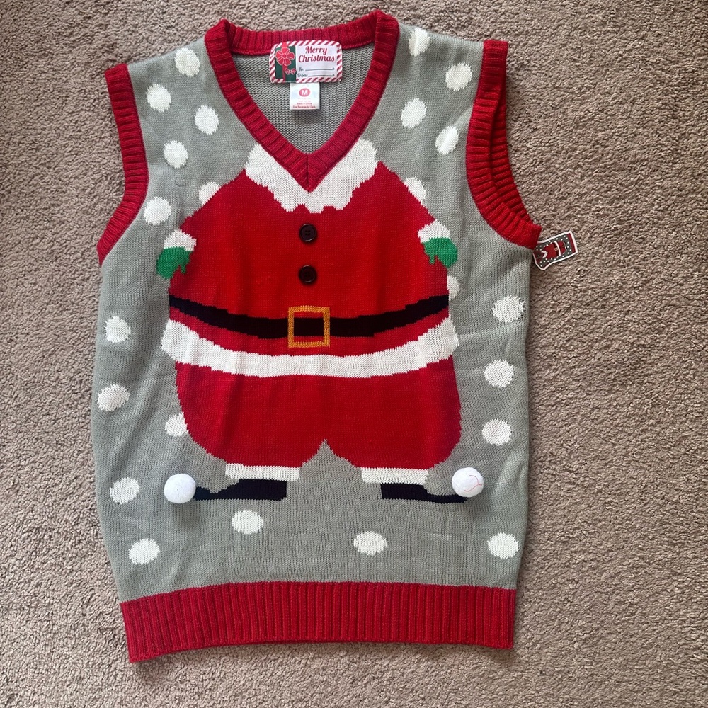 christmas sweater vest, size M, the sweater has a couple snags, photographed